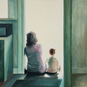 Grandmother and grandchild sitting in a doorway